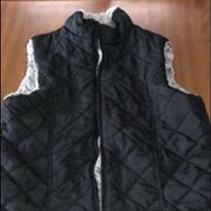 Black faux fur lined vest